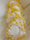 Lemon cookies on a marble surface.